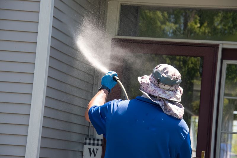 Power Washing on a Siding Surface